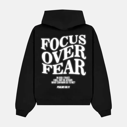 Reflective FOCUS OVER FEAR artwork on a hoodie