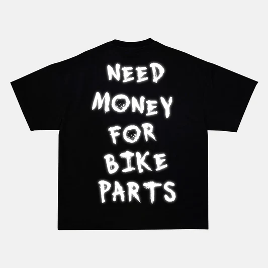 Reflective NEED MONEY FOR BIKE PARTS artwork on a t-shirt