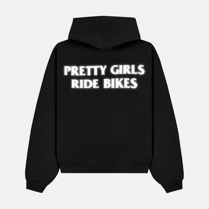 Reflective PRETTY GIRLS RIDE BIKES artwork on a hoodie