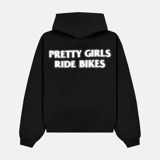 Reflective PRETTY GIRLS RIDE BIKES artwork on a hoodie
