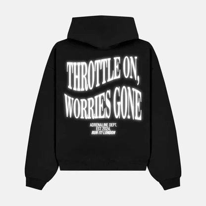 Reflective THROTTLE ON, WORRIES GONE artwork on a hoodie