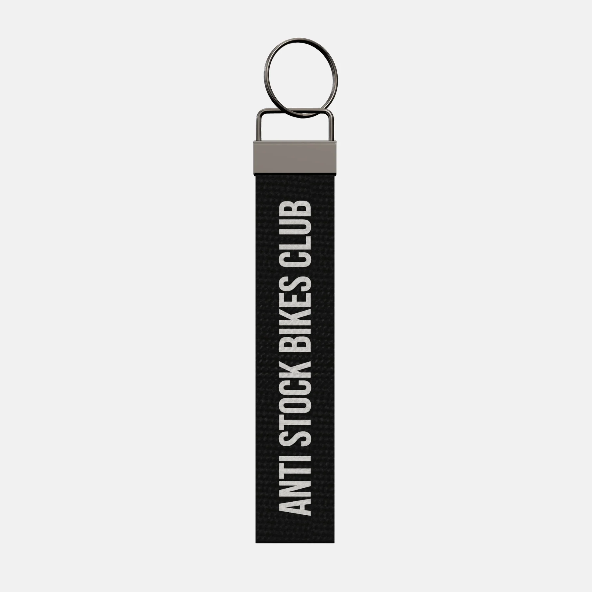 ANTI STOCK BIKES CLUB Keychain, front: ANTI STOCK BIKES CLUB in white print
