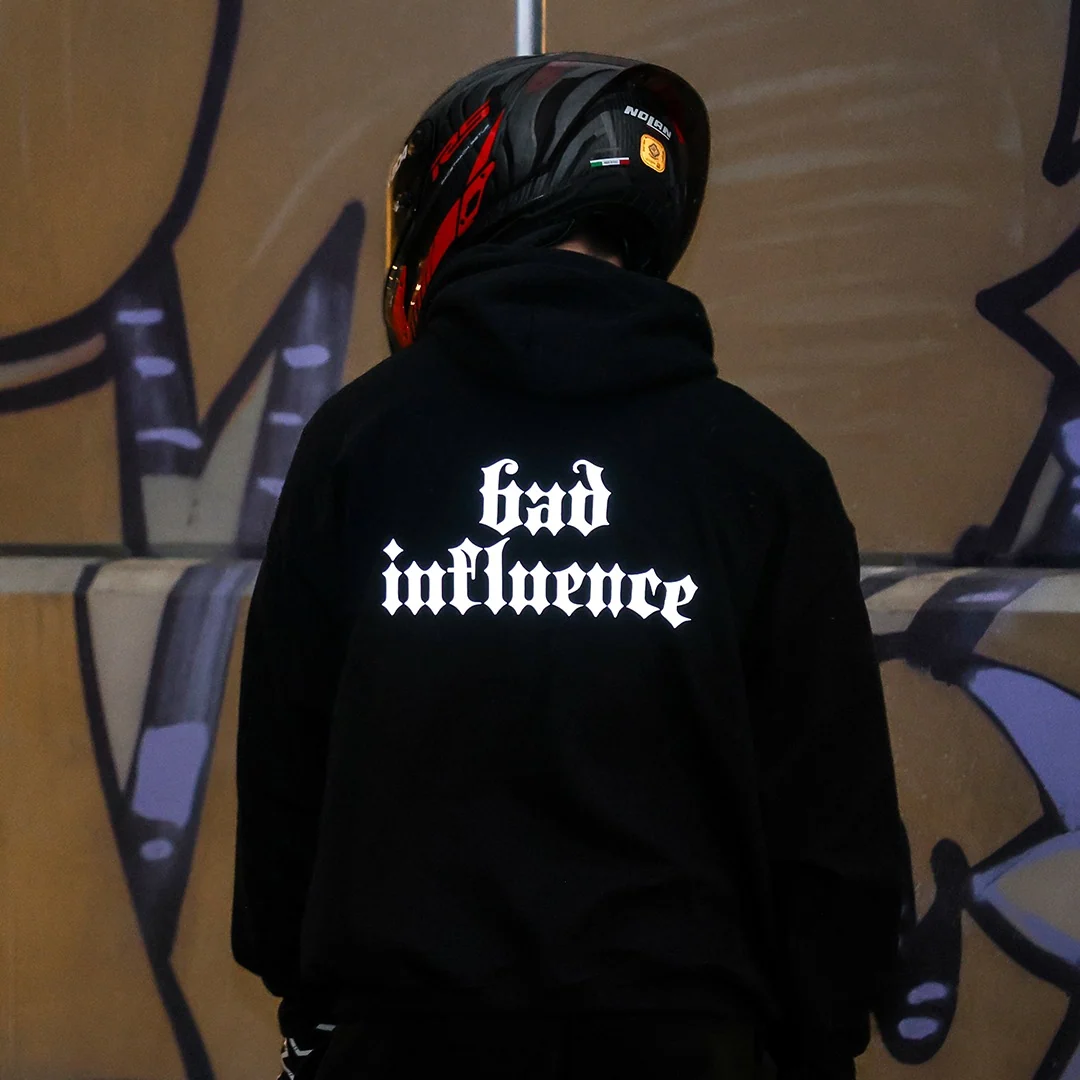 Rider wearing the BAD INFLUENCE Hoodie, back print