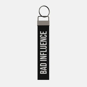 BAD INFLUENCE Keychain, front: BAD INFLUENCE in white print