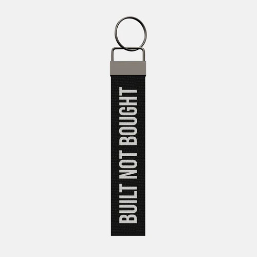 BUILT NOT BOUGHT Keychain, front: BUILT NOT BOUGHT in white print