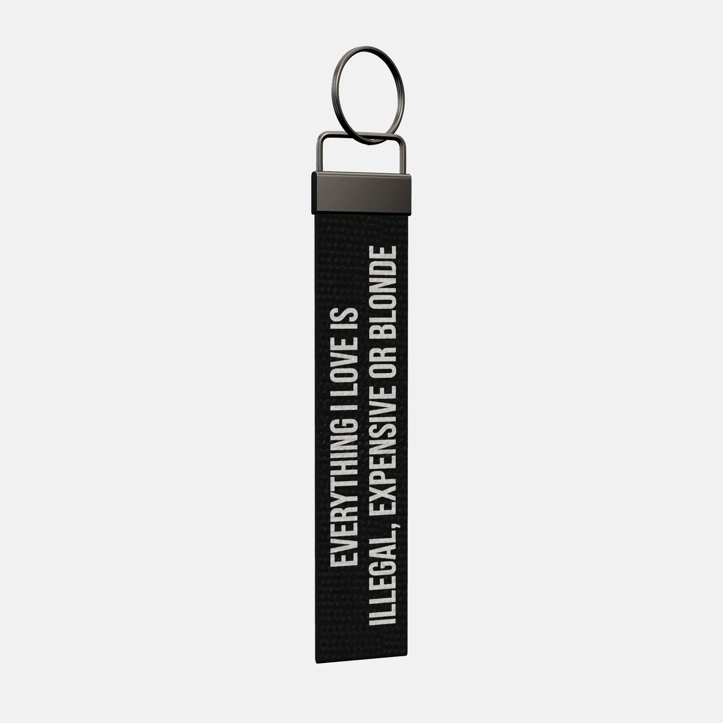 EVERYTHING I LOVE IS ILLEGAL, EXPENSIVE OR BLONDE Keychain at an angle, black-nickel clamp and split ring