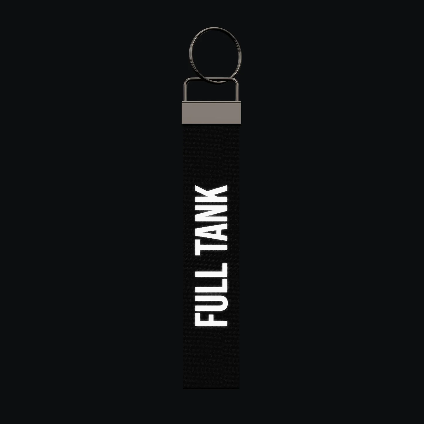 FULL TANK Keychain, reflective print lit up by a camera flash