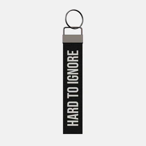 HARD TO IGNORE Keychain, front: HARD TO IGNORE in white print