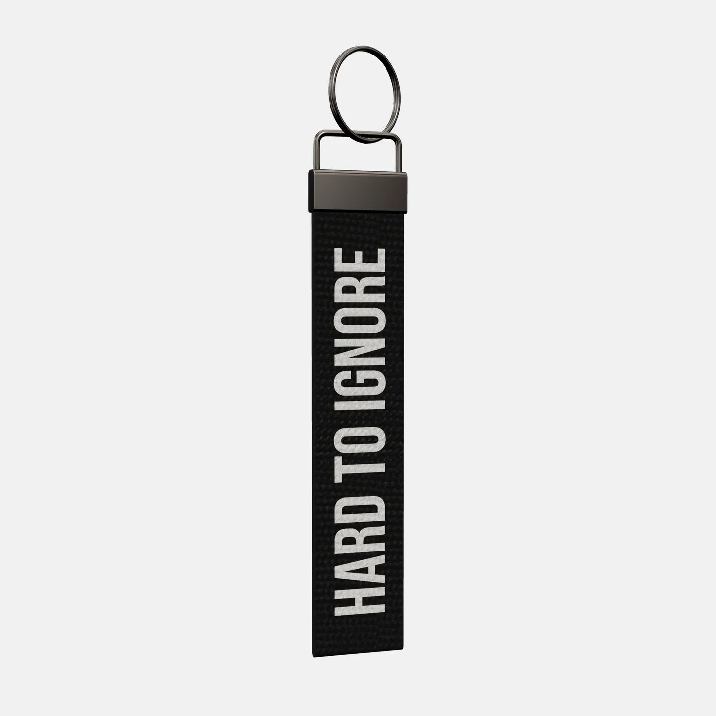 HARD TO IGNORE Keychain at an angle, black-nickel clamp and split ring