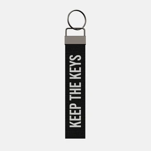 KEEP THE KEYS Keychain, front: KEEP THE KEYS in white print