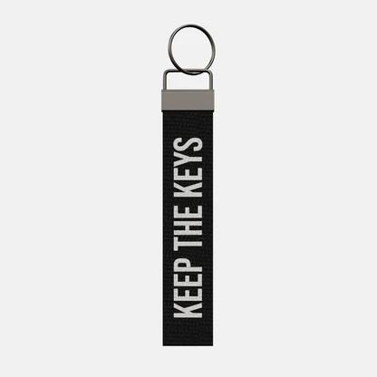 KEEP THE KEYS Keychain, front: KEEP THE KEYS in white print