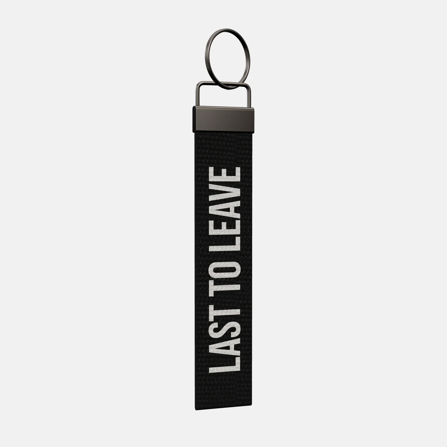 LAST TO LEAVE Keychain at an angle, black-nickel clamp and split ring