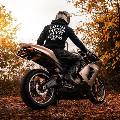 Rider wearing the LOUD PIPES SAVE LIVES Hoodie, back print
