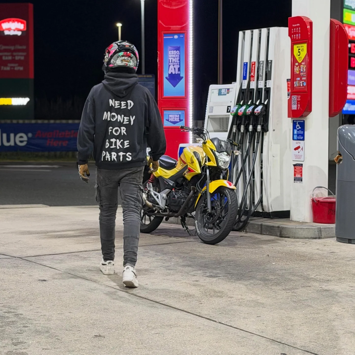Rider wearing the NEED MONEY FOR BIKE PARTS Hoodie, back print