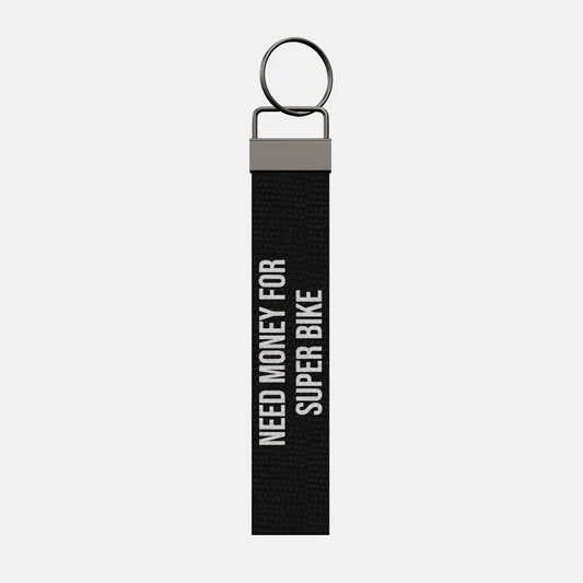 NEED MONEY FOR SUPER BIKE Keychain, front: NEED MONEY FOR SUPER BIKE in white print