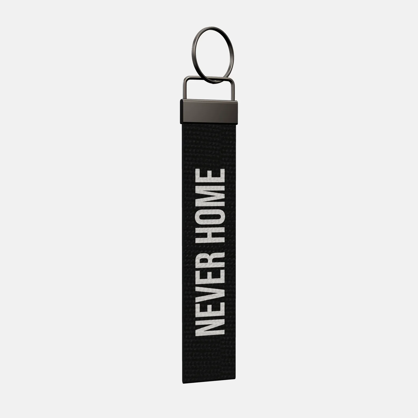 NEVER HOME Keychain at an angle, black-nickel clamp and split ring