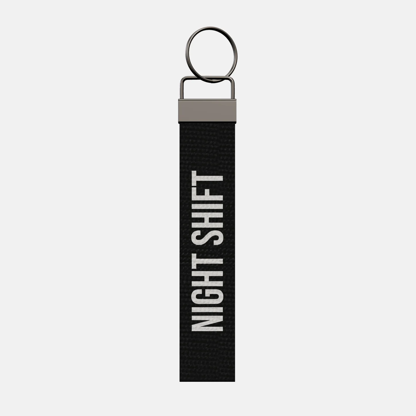NIGHT SHIFT Keychain, front: NIGHT SHIFT in white print