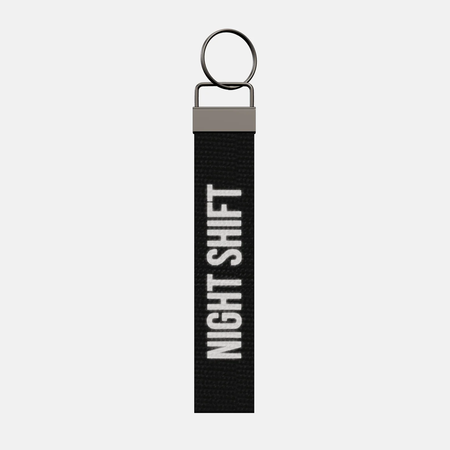 NIGHT SHIFT Keychain, front: NIGHT SHIFT in reflective print