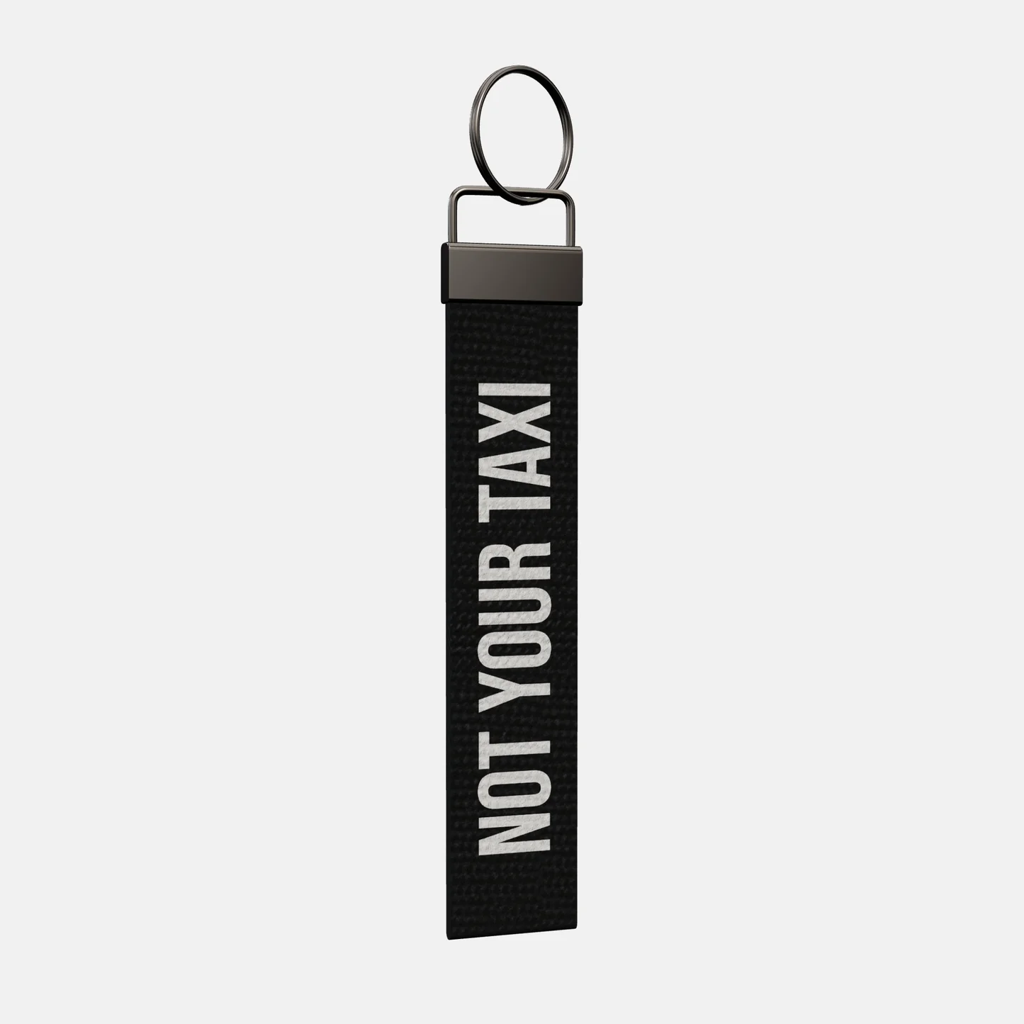 NOT YOUR TAXI Keychain at an angle, black-nickel clamp and split ring