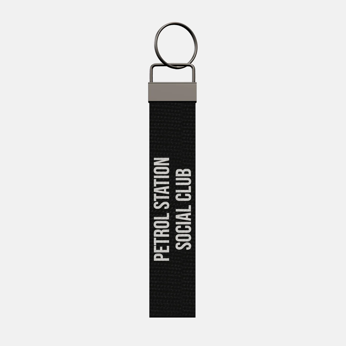 PETROL STATION SOCIAL CLUB Keychain, front: PETROL STATION SOCIAL CLUB in white print