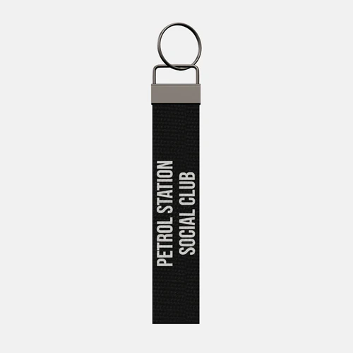 PETROL STATION SOCIAL CLUB Keychain, front: PETROL STATION SOCIAL CLUB in white print