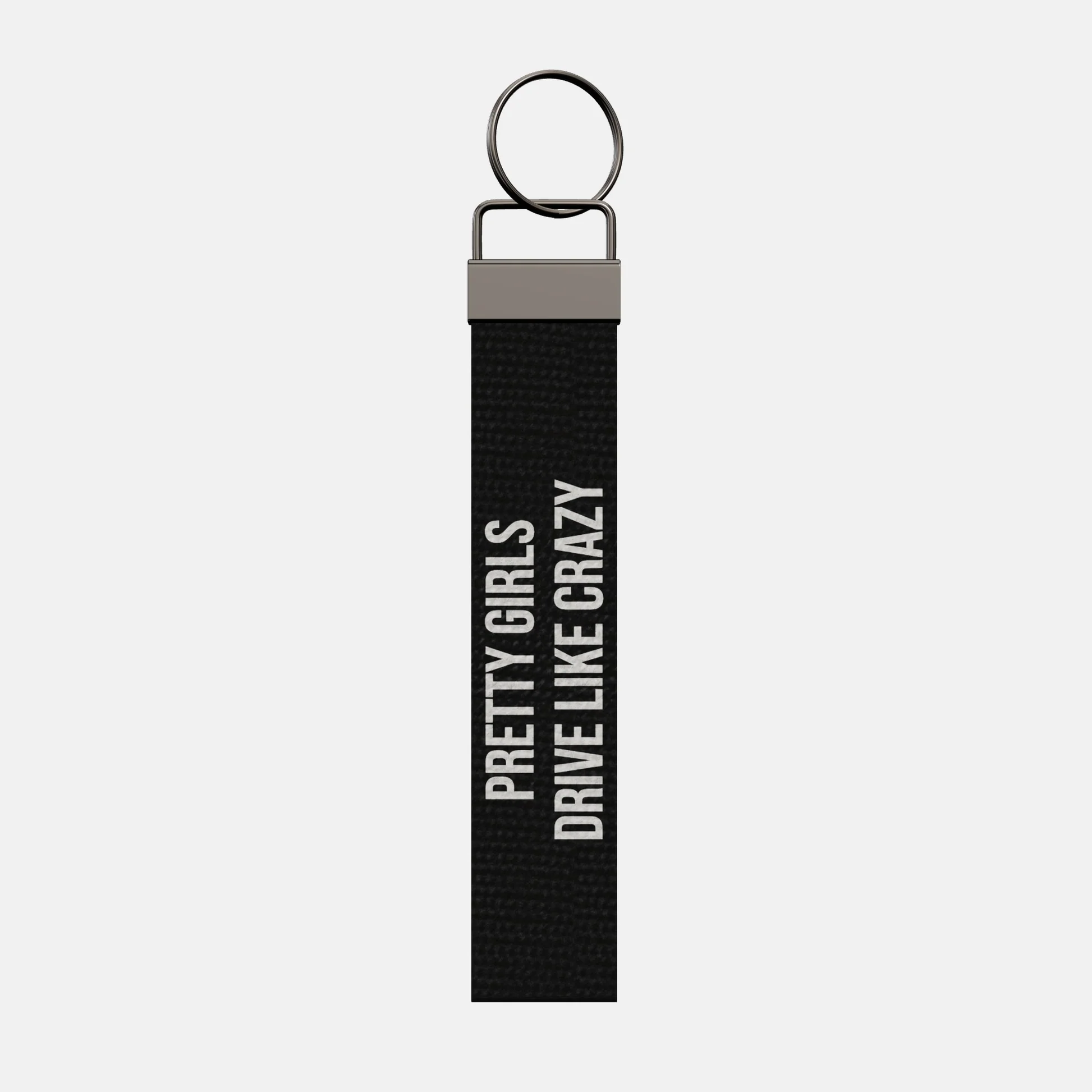 PRETTY GIRLS DRIVE LIKE CRAZY Keychain, front: PRETTY GIRLS DRIVE LIKE CRAZY in white print