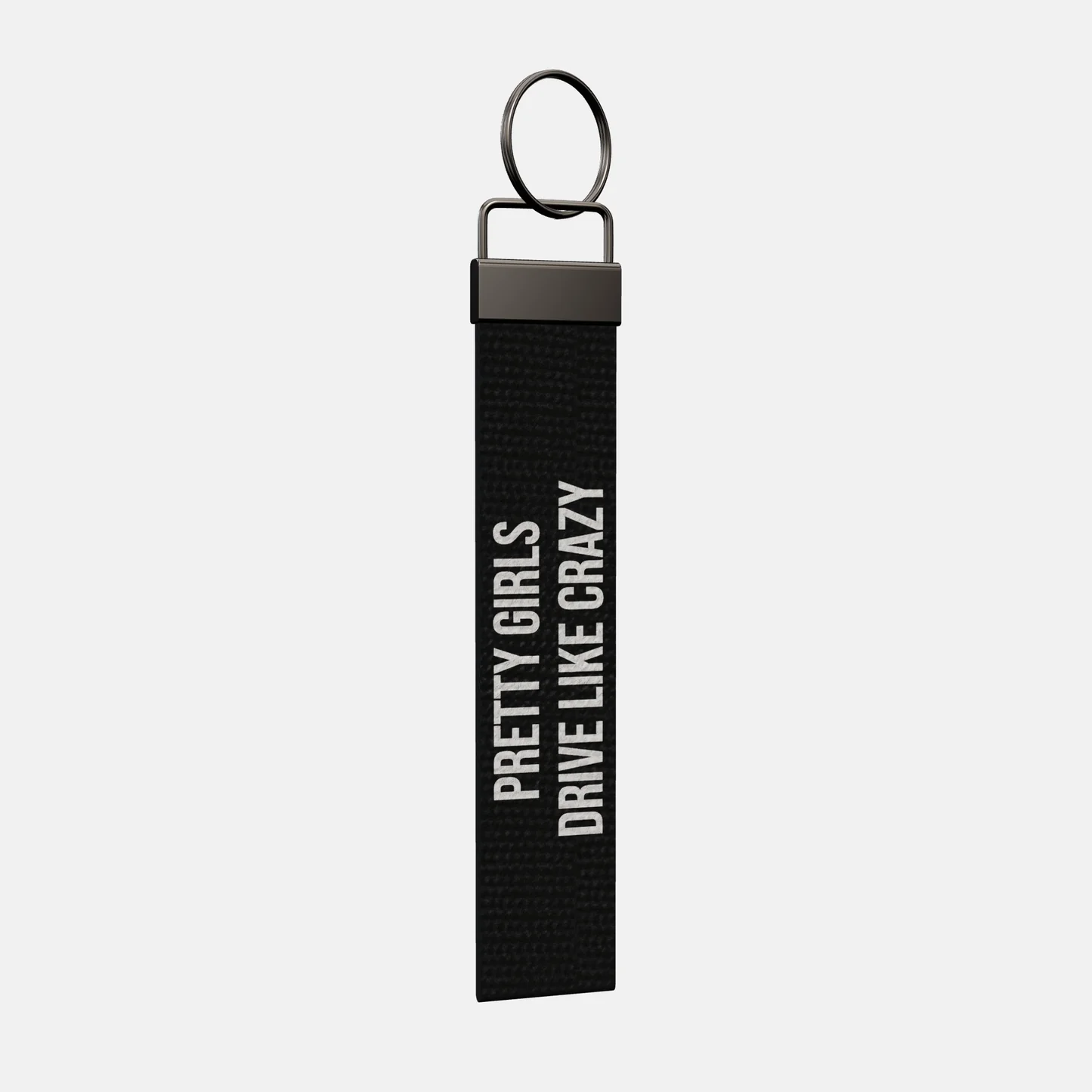 PRETTY GIRLS DRIVE LIKE CRAZY Keychain at an angle, black-nickel clamp and split ring
