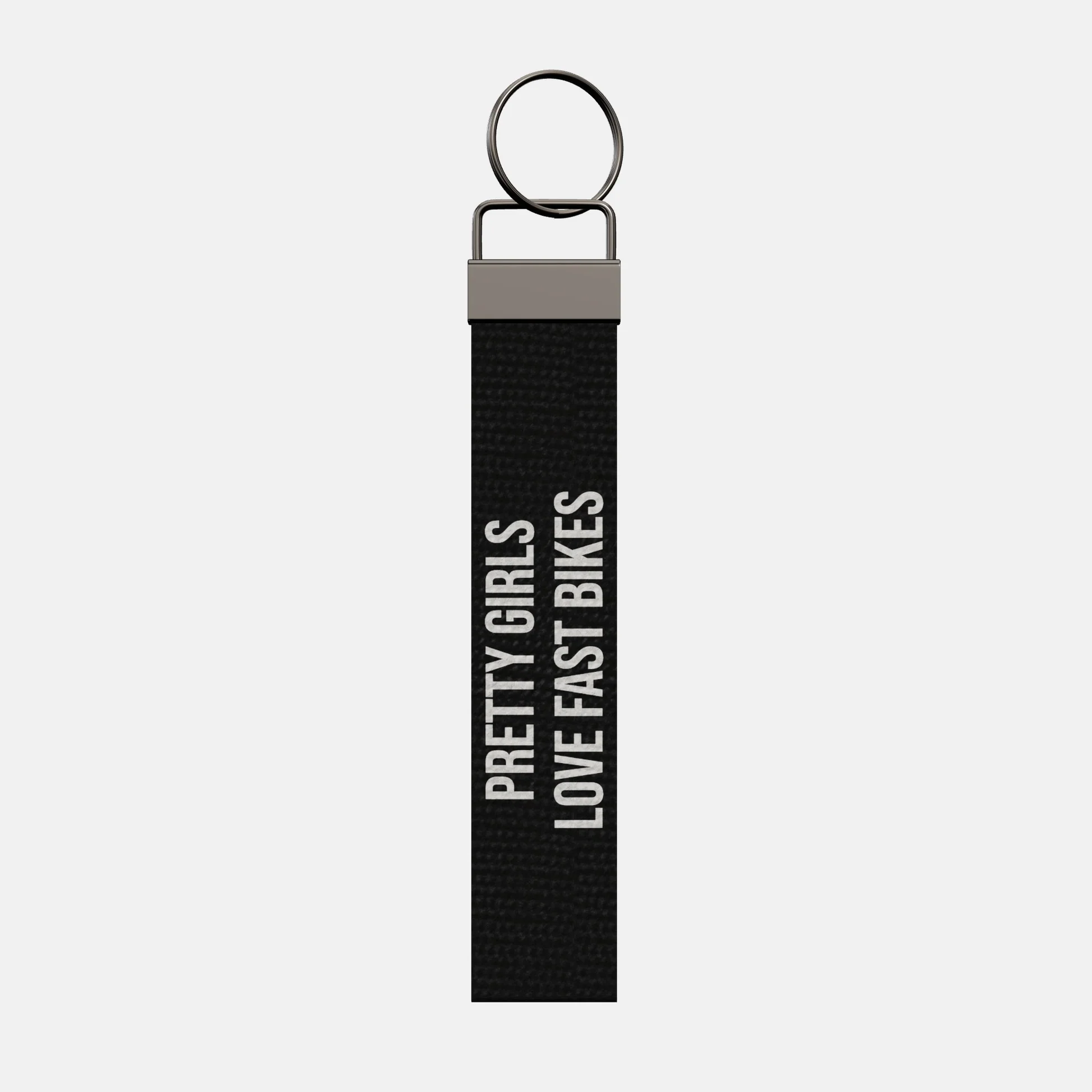 PRETTY GIRLS LOVE FAST BIKES Keychain, front: PRETTY GIRLS LOVE FAST BIKES in white print