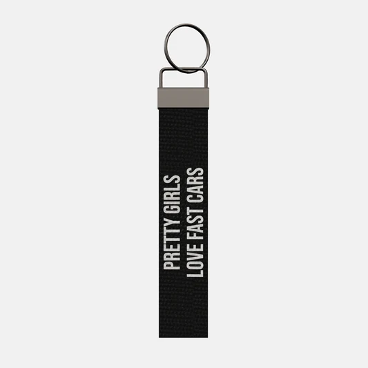 PRETTY GIRLS LOVE FAST CARS Keychain, front: PRETTY GIRLS LOVE FAST CARS in white print