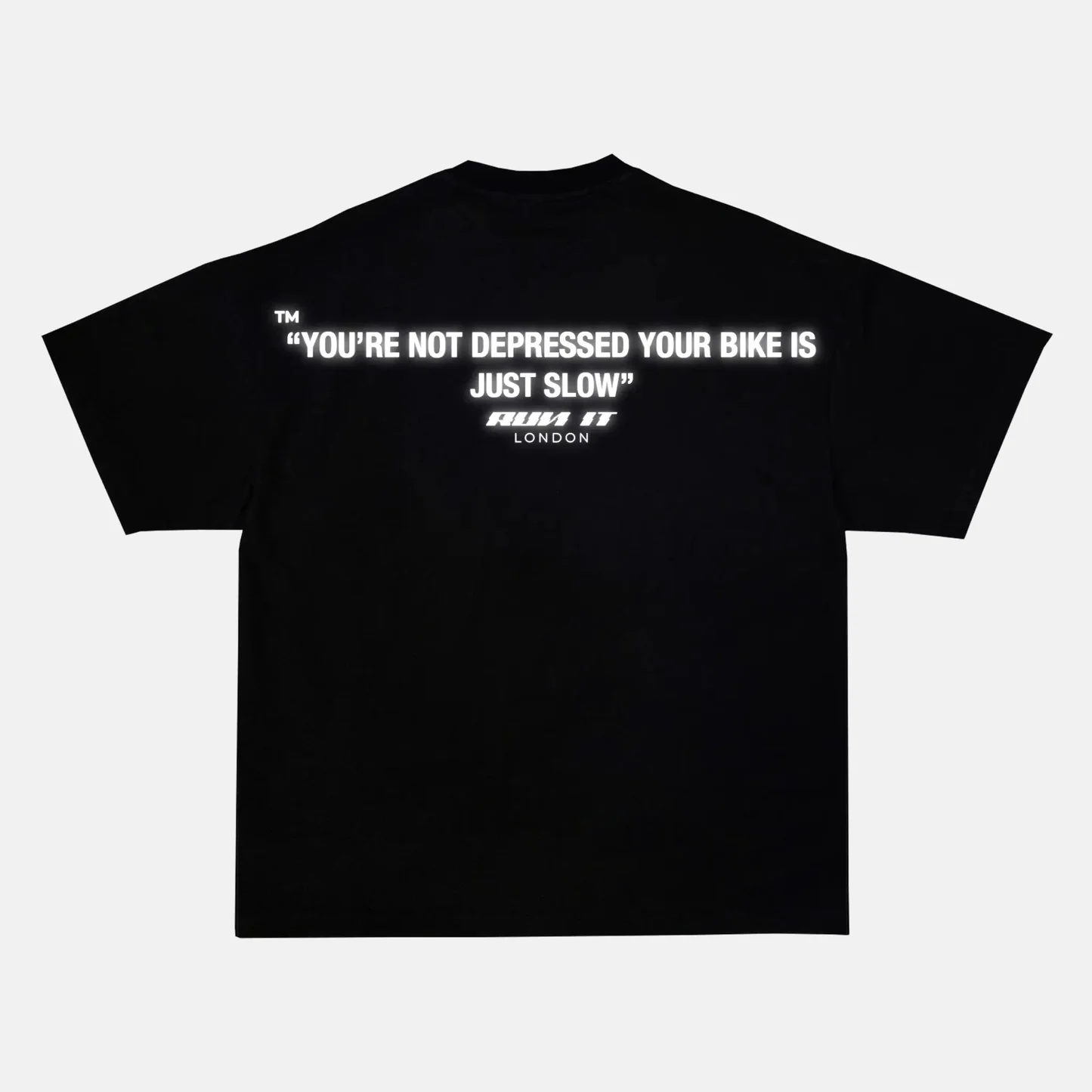 Reflective YOU'RE NOT DEPRESSED, YOUR BIKE IS JUST SLOW artwork on a t-shirt