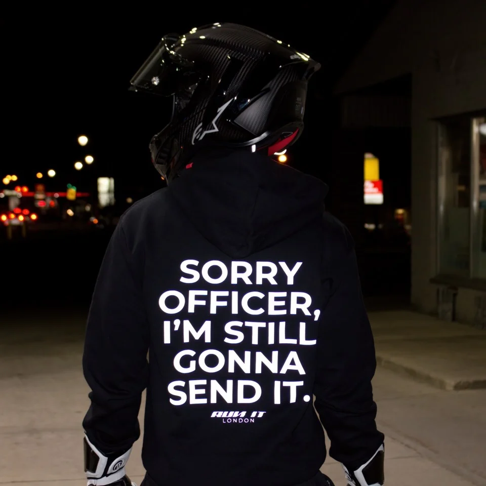 Rider wearing the SORRY OFFICER, I'M STILL GONNA SEND IT Hoodie, back print