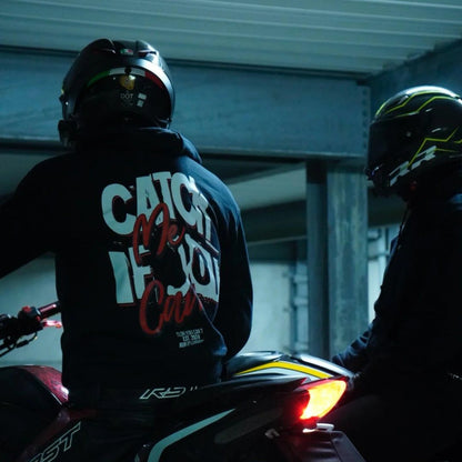 Rider wearing the CATCH ME IF YOU CAN Hoodie, back print