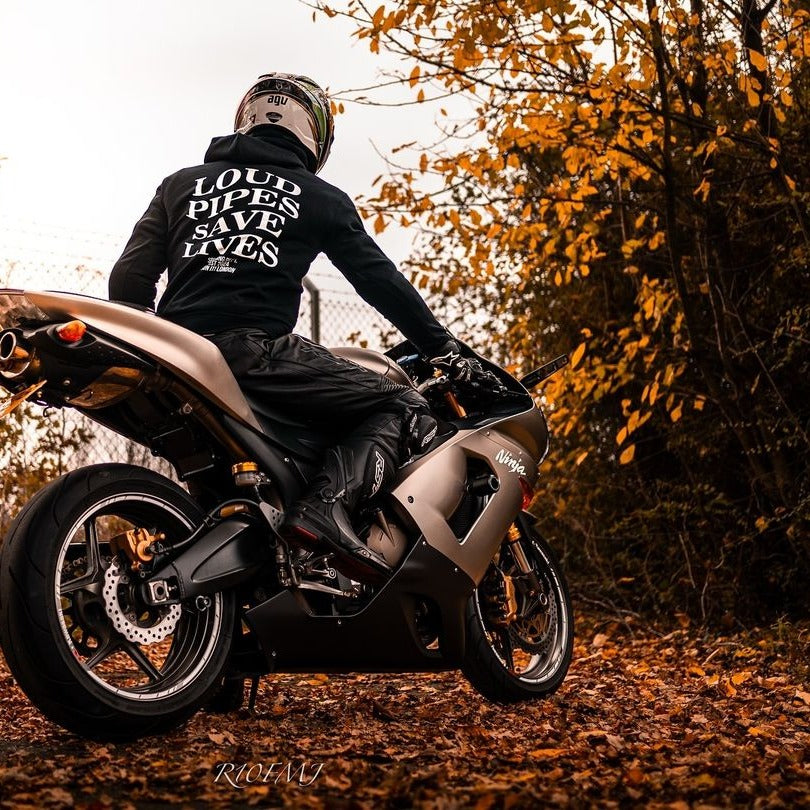 Rider wearing the LOUD PIPES SAVE LIVES Hoodie, back print