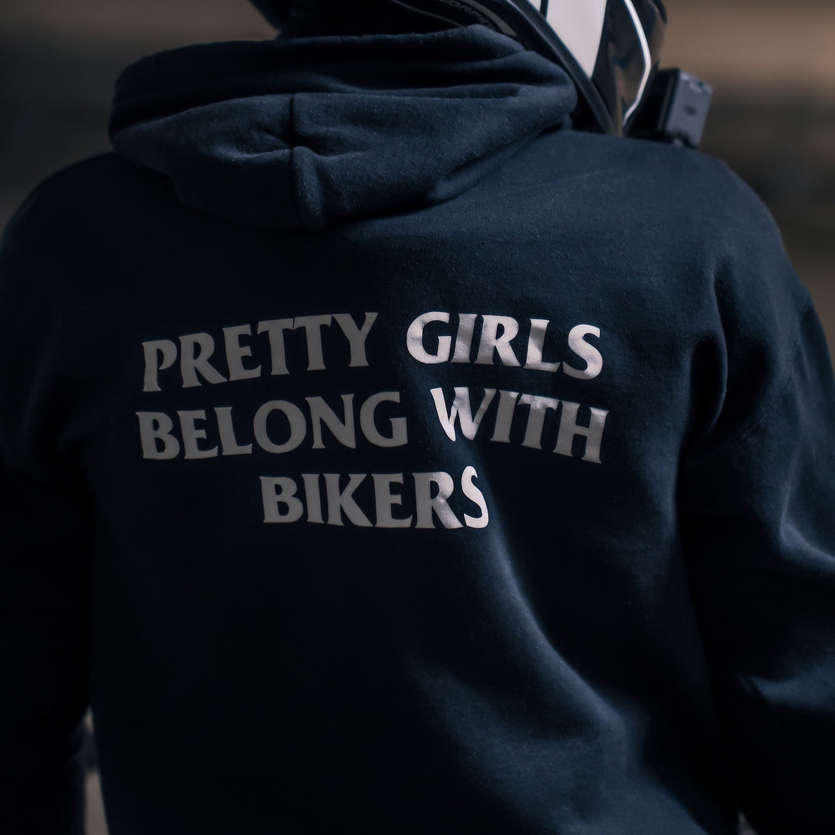 Rider wearing the PRETTY GIRLS BELONG WITH BIKERS Hoodie, back print