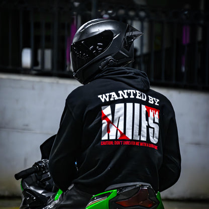 Rider wearing the WANTED BY MILFS Hoodie, back print