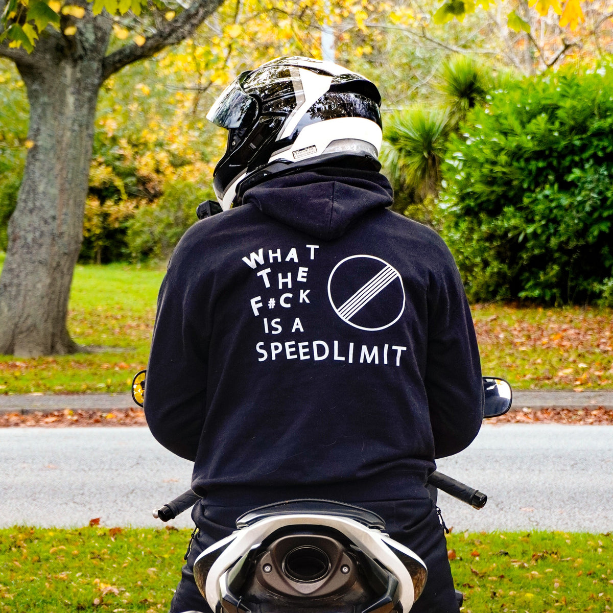 Rider wearing the WHAT THE F#CK IS A SPEEDLIMIT Hoodie, back print